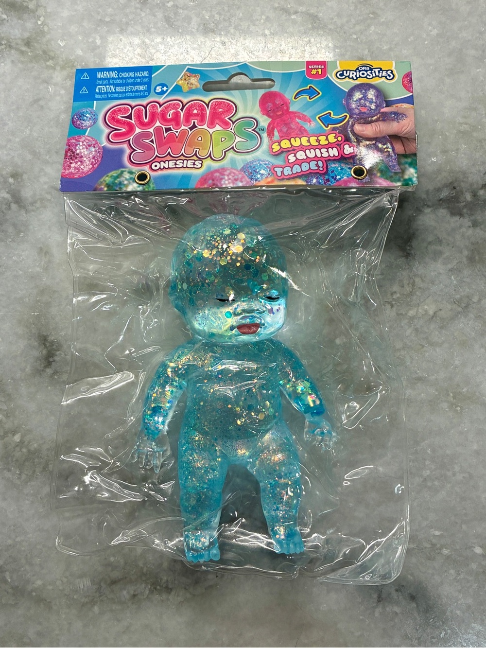 ✨ ORB Sugar Swaps Onesies Series 1 Blue Glitter Squishy Baby Fidget Toy ✨
